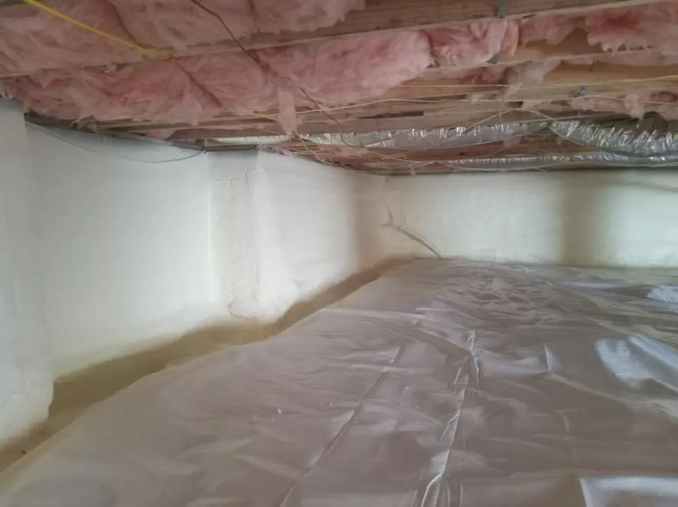 Crawl space encapsulation with closed-cell spray foam for Commercial Roof Restoration in Buffalo